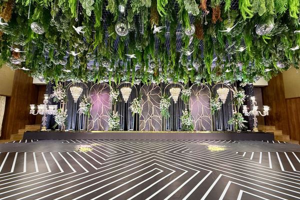 Hanging greenery stage at Siddharth Banquets