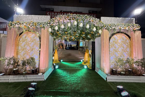 Illuminated entrance gate at Siddharth Banquets