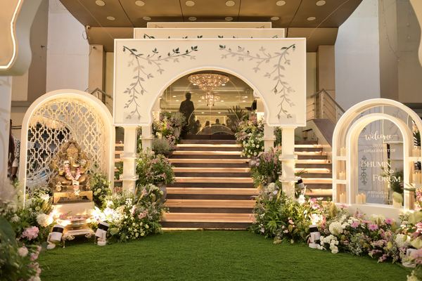 Warm lit arch stairway at Siddharth Banquets, Andheri West Mumbai
